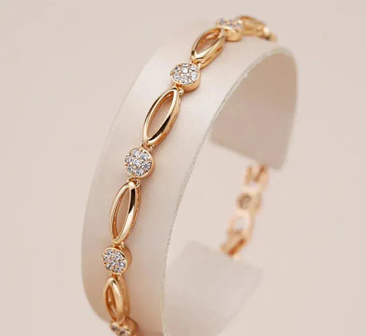 Elegant gold bracelet with zircons