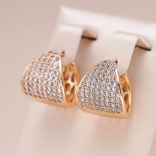 Small shiny gold earrings