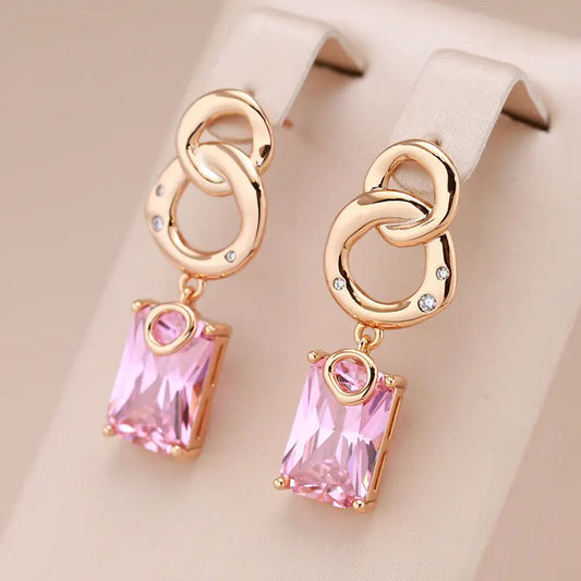 Small earrings with crystals in gold color