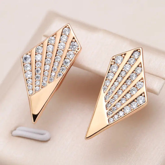 Gold earrings with zircons