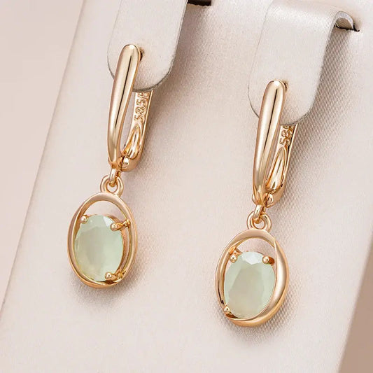 Earrings with green crystals