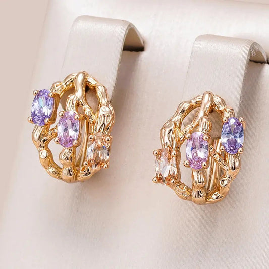 Exotic, elegant earrings made of gold and colored stones