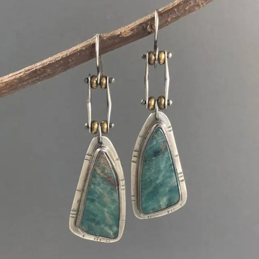 Silver earrings with green stone