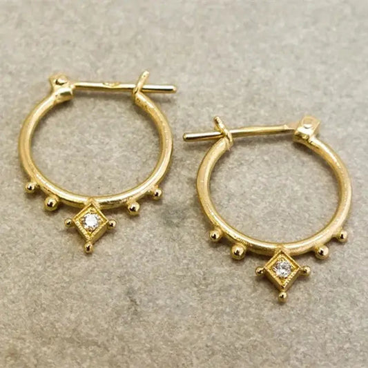 Gold vintage earrings with crystals