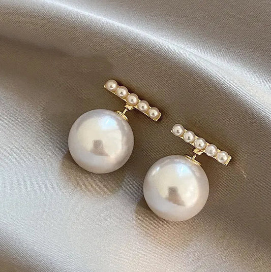 Gold T-shaped beaded earrings