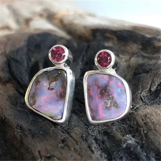 Lilac vintage earrings with red zircons