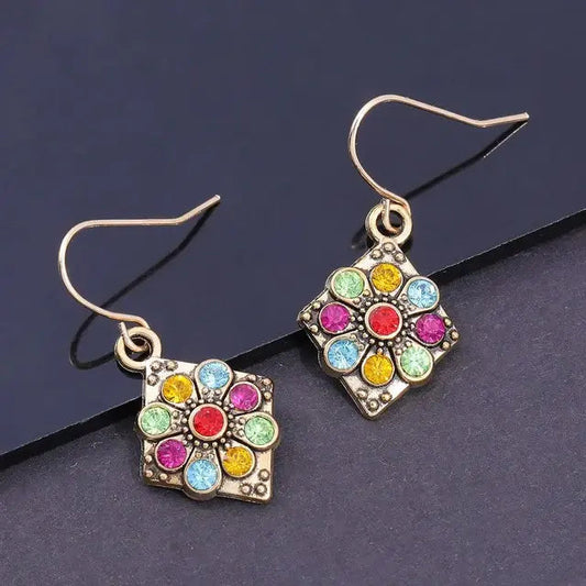 Vintage style mandala earrings with colored crystals