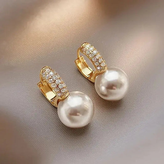 Pearl earrings with crystals