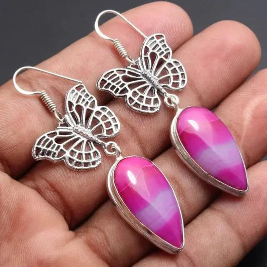 Butterfly earrings with pink stone
