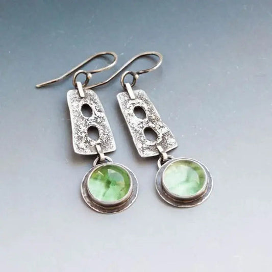 Boho earrings made of green crystal in silver color