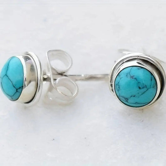 Silver earrings with blue stone