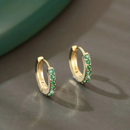 Elegant earrings with green zirconia inlay