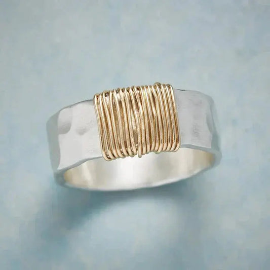 Silver ring with gold thread