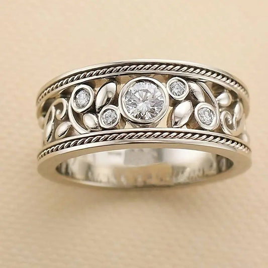Silver ring with zircons