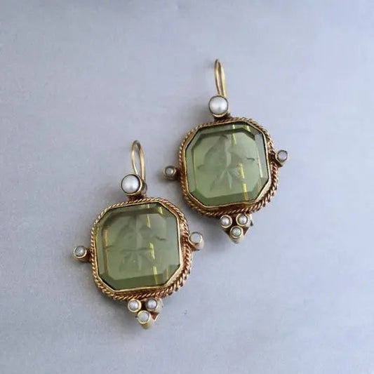 Green earrings with pearls in vintage style