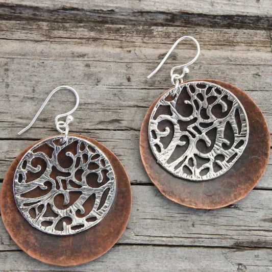 Sterling silver earrings with rounded bronze hole in vintage style