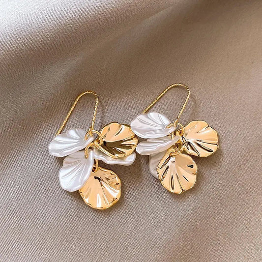 Elegant earrings made of white and gold petals