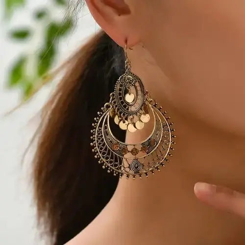 Gold mandala earrings in vintage style