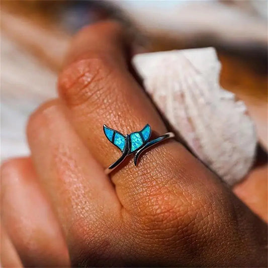 Silver ring with opal and whale fin